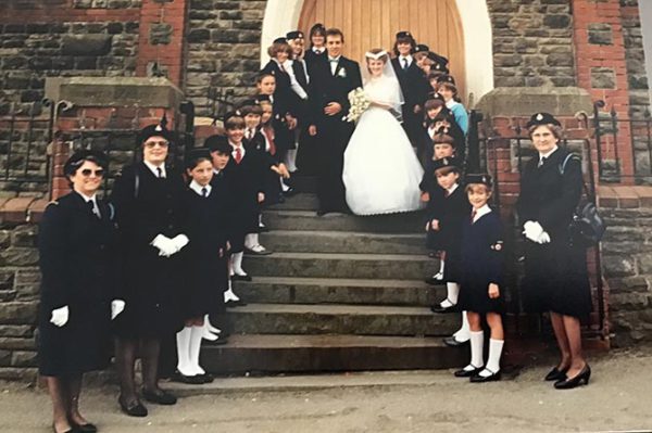 Andy and Julie Baker on the steps of Mount Pleasant Baptist Church on their wedding day in September 1986
