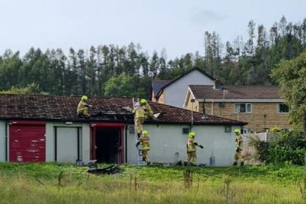 Firefighters dealing with the blaze at Llanbradach Library