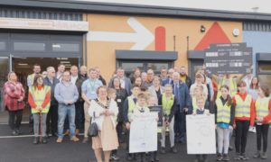 School children were joined by dignitaries, including Mayor Liz Aldworth and Wayne David MP, at the official opening of the Penallta Reuse Shop