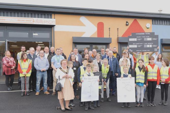 School children were joined by dignitaries, including Mayor Liz Aldworth and Wayne David MP, at the official opening of the Penallta Reuse Shop