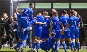Trethomas Bluebirds players celebrating their shock victory over Haverfordwest County