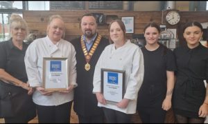 Staff at the Plaza Cafe with Blackwood Town Mayor George Edwards