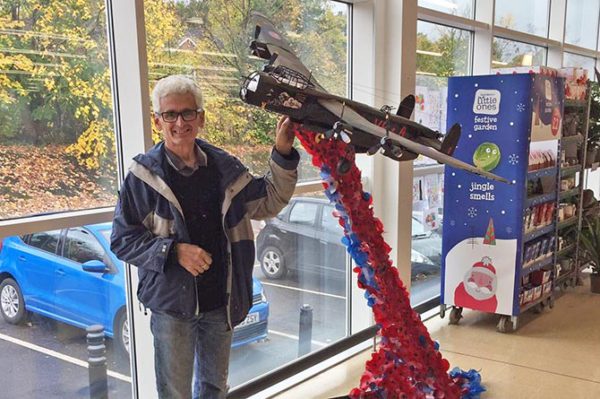 John Sidoli with his model Lancaster bomber in Pontllanfraith Sainsbury's