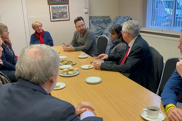 The First Minister meeting members of the Aber Valley Heritage Group alongside Hefin David MS