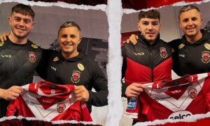 Joe Coope-Franklin, left, and Billy Walkley, second from right, posing with a Salford Red Devils shirt with coach Paul Rowley