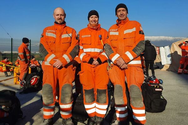 Emma Atcherley, centre, with fellow South Wales firefighters Luke Davison, left, and Robert Buckley 