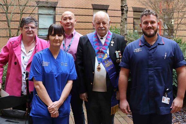 From left: Jenny Young, breast reconstruction nurse specialist Julia Warwick, consultant plastic surgeon Leong Hiew, Colin Young and deputy head of nursing Lyn Hopkin