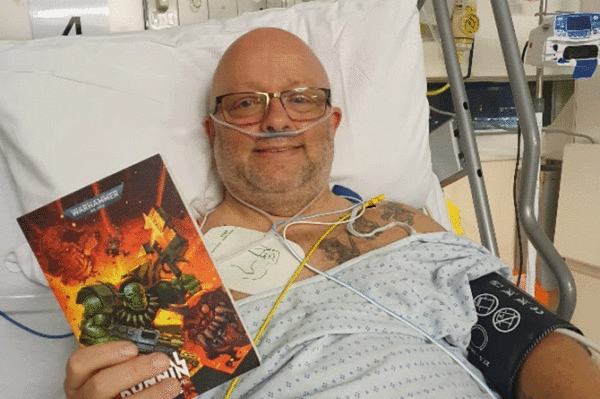Peter Belson recovering in hospital after suffering a cardiac arrest