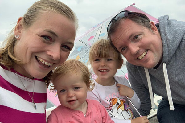 Sarah Harris-Clint and husband Gareth with kids Ella and Lucy