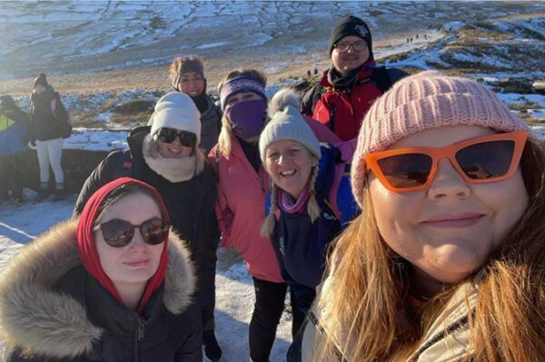Staff at Ysgol Gymraeg Gilfach Fargod climbed Pen y Fan 20 times between them
