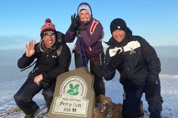 Staff at Ysgol Gymraeg Gilfach Fargod climbed Pen y Fan 20 times between them