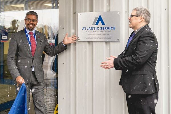 Wales' Economy Minister Vaughan Gething, left, officially unveiling Atlantic Service Company's new site in Blackwood