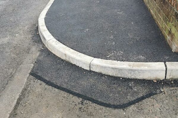 The kerb has been rebuilt by the council, with plans for a dropped kerb being scrapped after work had started