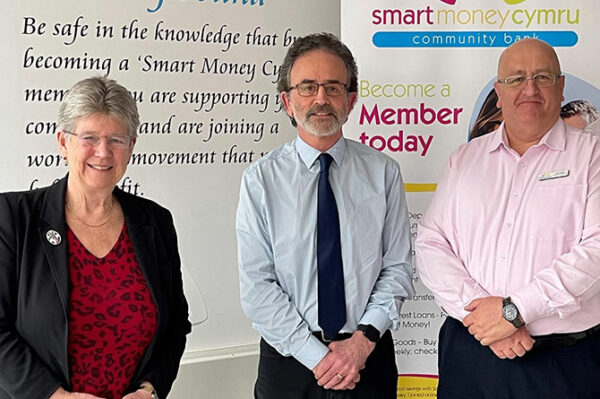 Social Justice minister Jane Hutt with Smart Money Cymru's Alun Taylor and Mark White