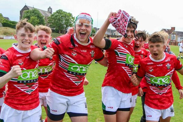 Wales under 16s celebrate their win over England Community Lions in 2022