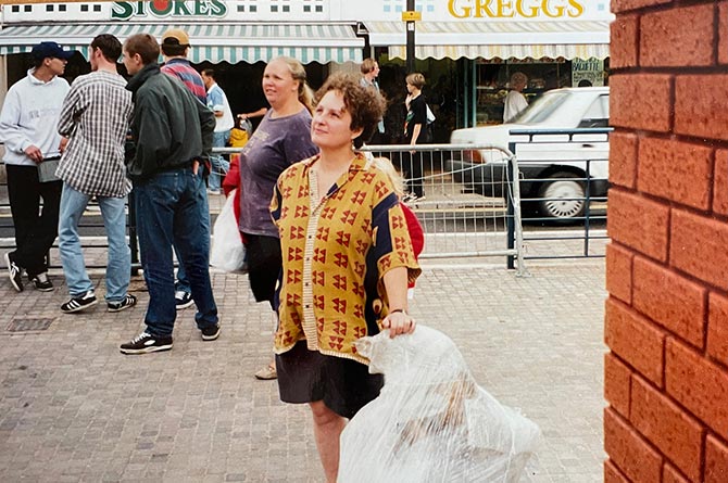 Julie Westerman watching as her sculptures are fitted on Windsor Street square