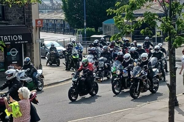 Motorcycles passing through Caerphilly during the charity ride