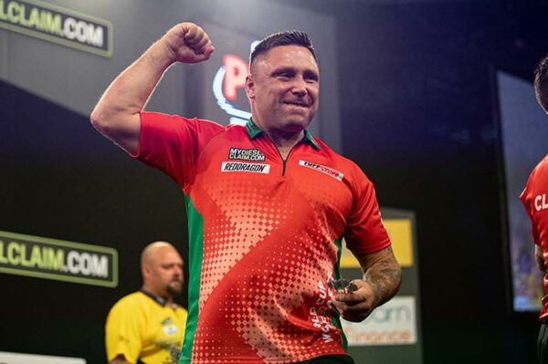 Gerwyn Price celebrating during Wales' 2023 World Cup of Darts win