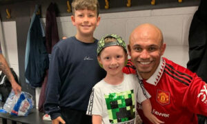 Zac Davies, middle, with former professional footballer Danny Webber