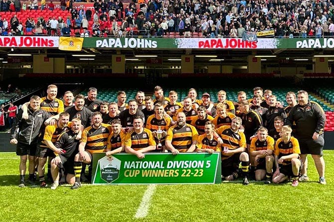 Crumlin RFC celebrate their Division Five Cup win at the Principality Stadium