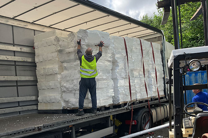 Polystyrene being loaded onto a lorry