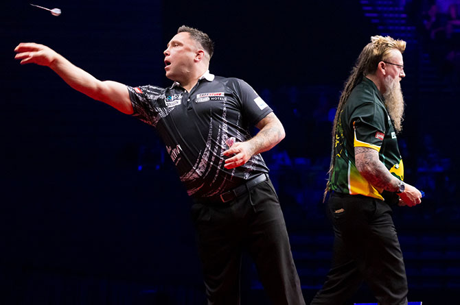Gerwyn Price in action against Simon Whitlock at the New Zealand Darts Masters