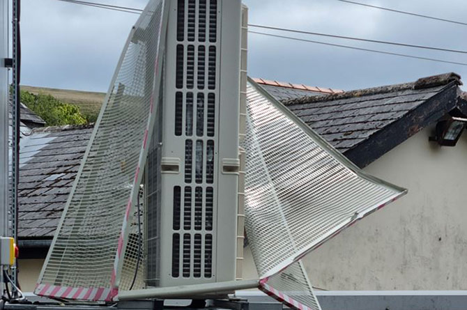 The damage has been caused to a piece of equipment on the roof of the building