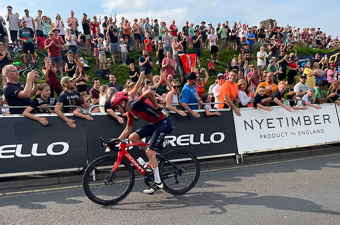 Spain's Carlos Rodriguez cycles past crowds in Caerphilly
