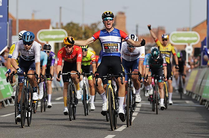 Olav Kooij crossing the finishing line in Newark-on-Trent to claim his fourth consecutive stage win