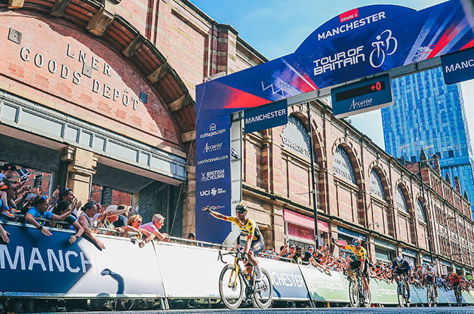 Olav Kooij crossing the finishing line in Manchester