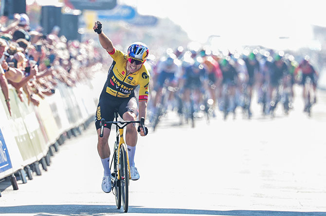 Wout van Aert crossing the stage five finishing line in Felixstowe, Suffolk