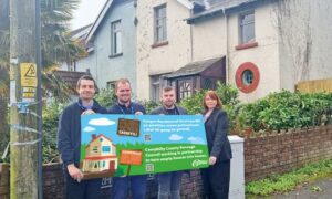 Councillor Shayne Cook, second from right, with members of Caerphilly Council's empty property team