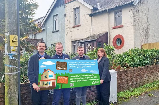 Councillor Shayne Cook, second from right, with members of Caerphilly Council's empty property team
