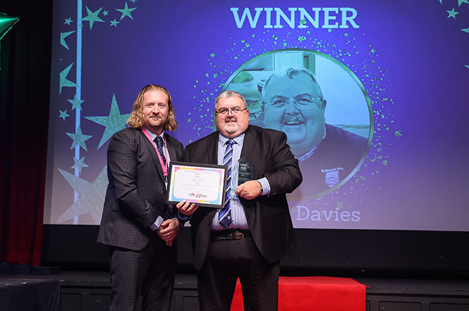 Mostyn Davies receiving his award from GAVO CEO Steve Tiley