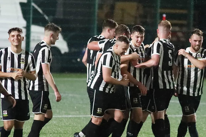 All smiles for Risca United after their 3-0 win over Tredegar Town
