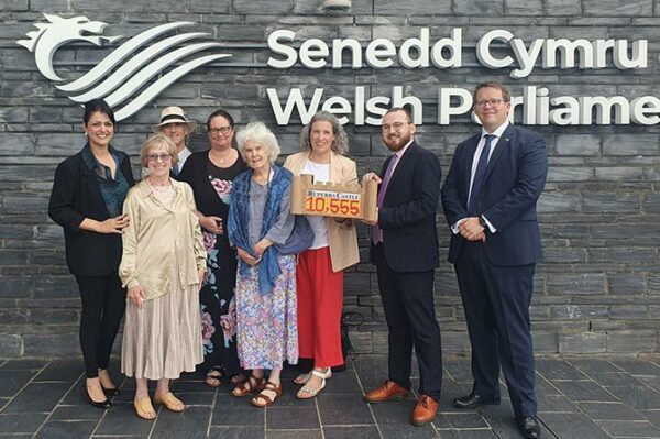 Members of the Ruperra Castle Preservation Trust at the Senedd with Machen and Rudry councillor Amanda McConnell and Senedd Members Natasha Asghar, Jack Sargeant and Joel James