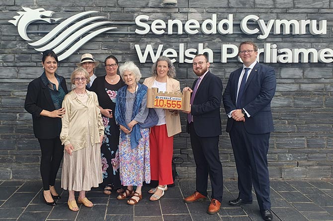 Members of the Ruperra Castle Preservation Trust at the Senedd with Machen and Rudry councillor Amanda McConnell and Senedd Members Natasha Asghar, Jack Sargeant and Joel James