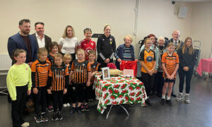 Wendy Slade's family celebrated her achievements alongside members of the Football Association of Wales