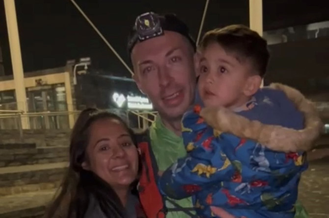 Andrew with family after completing the race