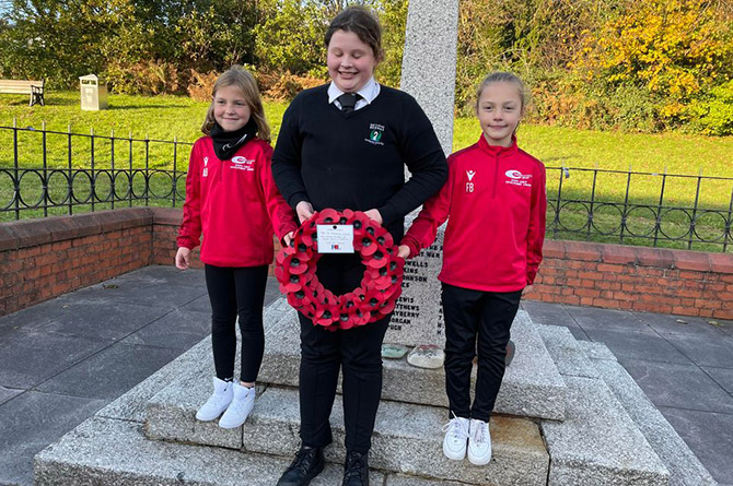 A wreath being laid at Machen war memorial