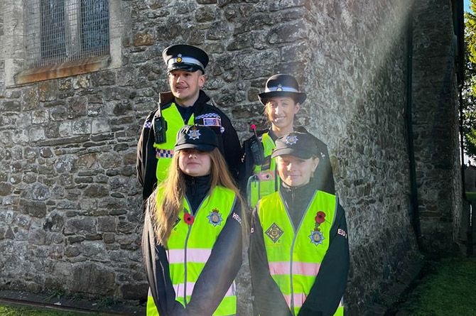 Rhydri Primary School pupils and Gwent Police officers at St James' Church, Rudry