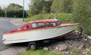 A boat dumped near Caerphilly Business Park