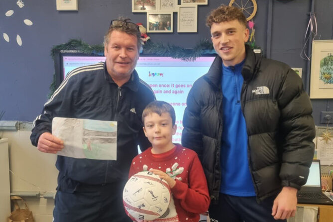 Former Manchester United player Derek Brazil along with competition winner Alfie Worthing, and Trethomas Bluebirds goalkeeper Harry Irving
