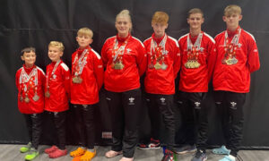 From left: Medal winners Emir Isik, Llewellyn Baylis, Oskar Watkins, Ruby Carter, Reuben West, Sam Coakley, and Jac Watkins