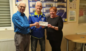 Club chairman Kenny Ball, centre, with Cllr Colin Mann and Cllr