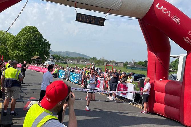 Dewi Griffiths crossing the finishing line after smashing the course record he himself set two years ago