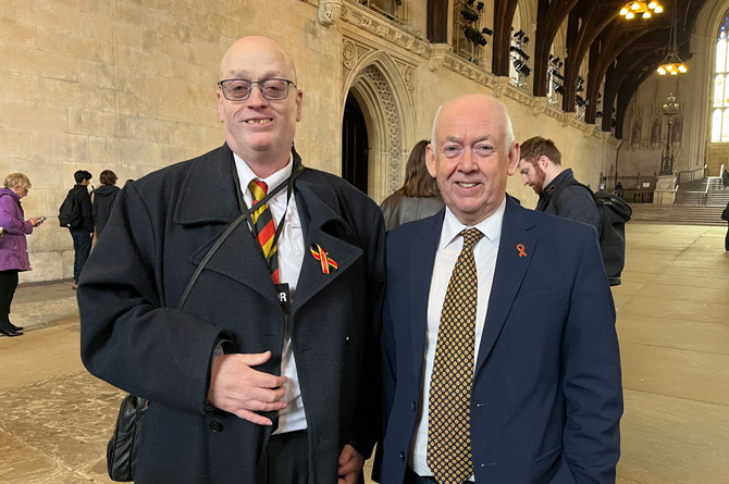 Infected blood scandal victim Lee Stay, left, alongside MP for Caerphilly Wayne David