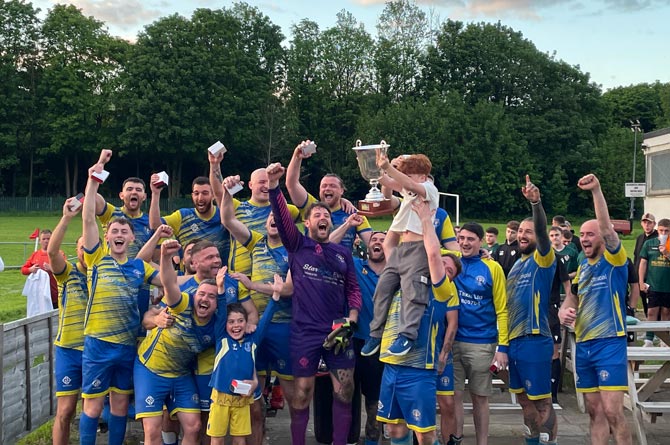 Llanbradach AFC celebrating after their 2-1 win over Gilfach FC