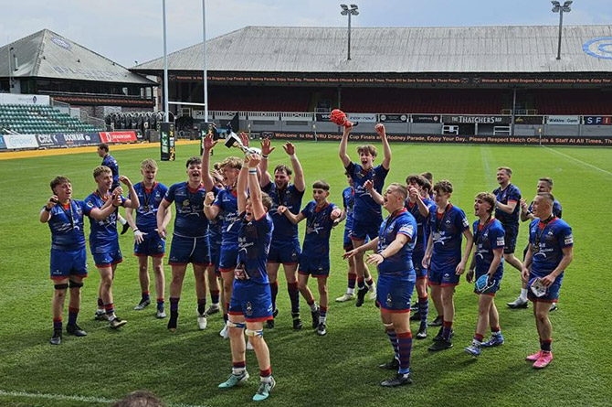 Senghenydd RFC's under-16s celebrate their Dragons Cup victory at Rodney Parade