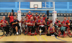Wales' wheelchair rugby league team celebrating their 2023 Celtic Cup victory